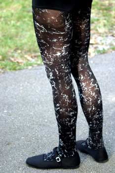 Silver splash on black tights.