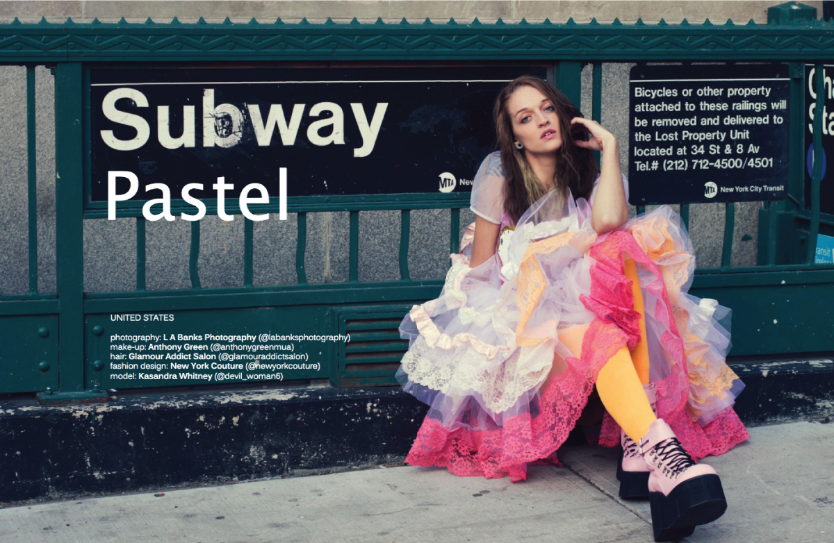 model sitting on the streets wearing white and pink dress and yellow tights